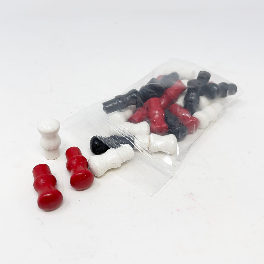 Black, Red, and White Game Pieces