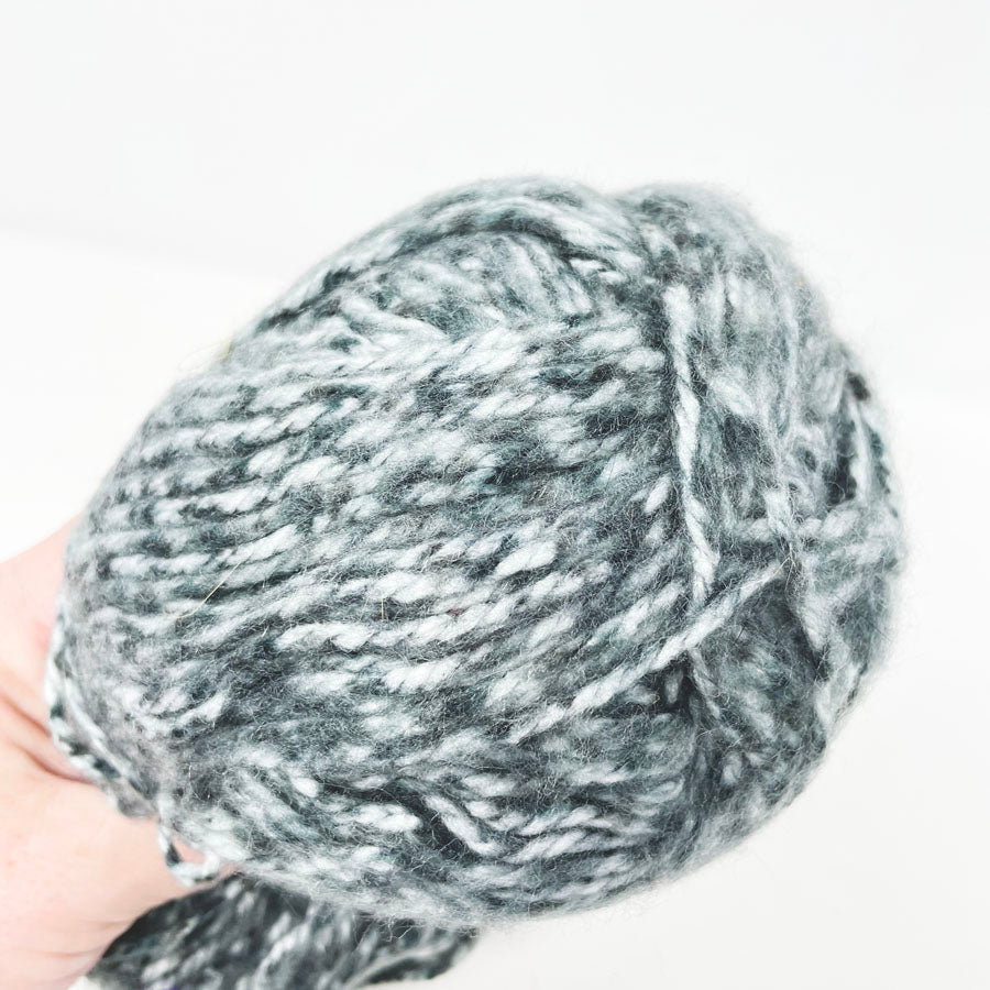 Unmarked Dark Gray Flecked Yarn Skein